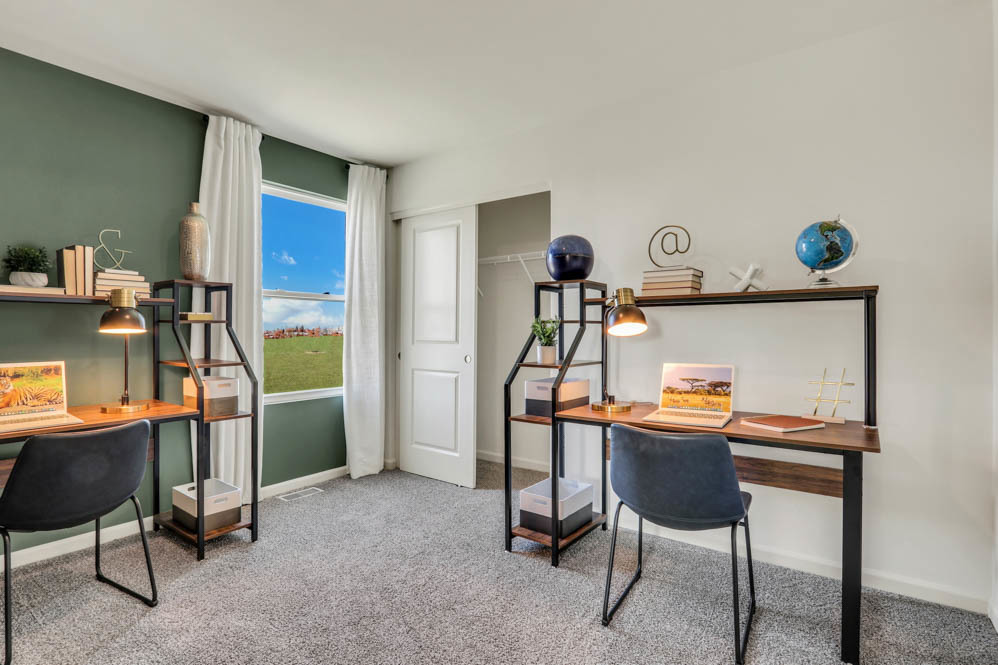 2486 Semillon Street Oswego, IL 60543 - Photo 17 of 27 a room with furniture a desk and a chair