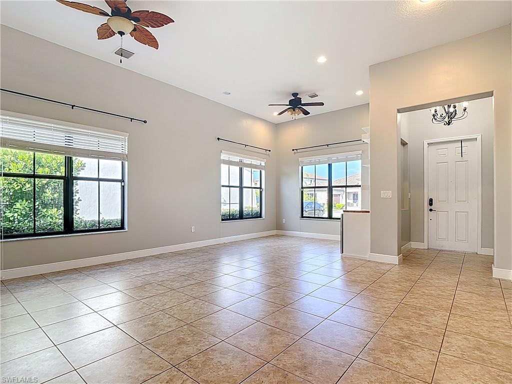 5118 Genoa Street Ave Maria, FL 34142 - Photo 3 of 28 a view of an empty room with a window