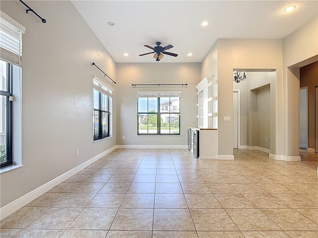 5118 Genoa Street Ave Maria, FL 34142 - Photo 4 of 28 a view of an empty room with a window