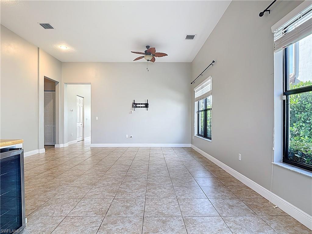 5118 Genoa Street Ave Maria, FL 34142 - Photo 7 of 28 a view of an empty room with a window
