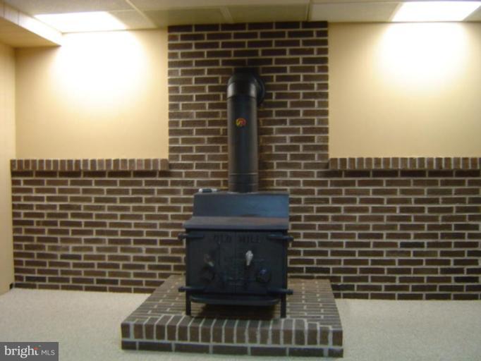 21635 Keeney Road Freeland, MD 21053 - Photo 22 of 30 Familyroom Air-Tight Wood Stove