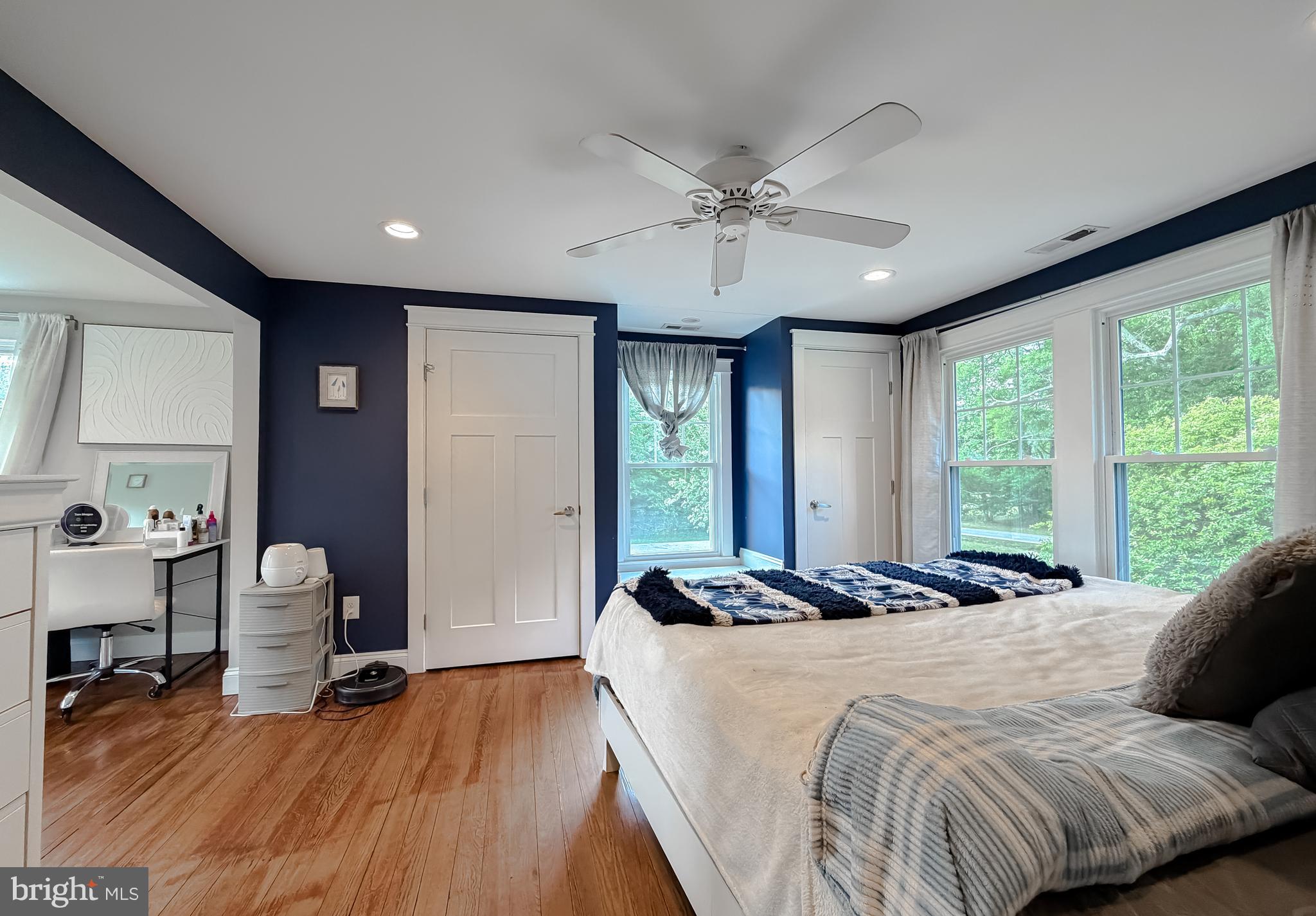 16146 Thomas Road Piney Point, MD 20674 - Photo 19 of 57 a bedroom with a bed and a large window