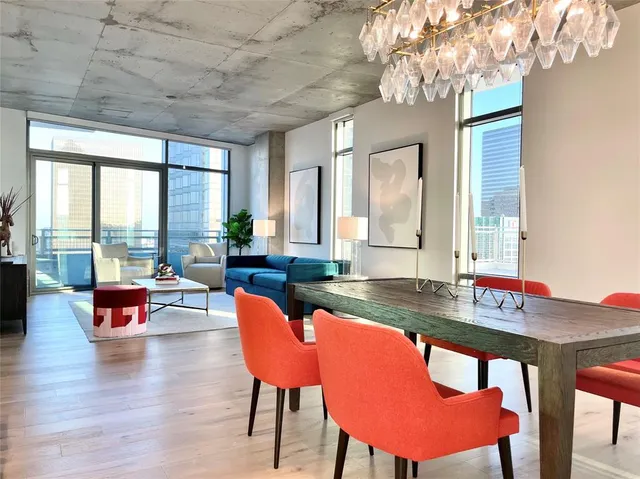 a view of a dining room with furniture window and outside view