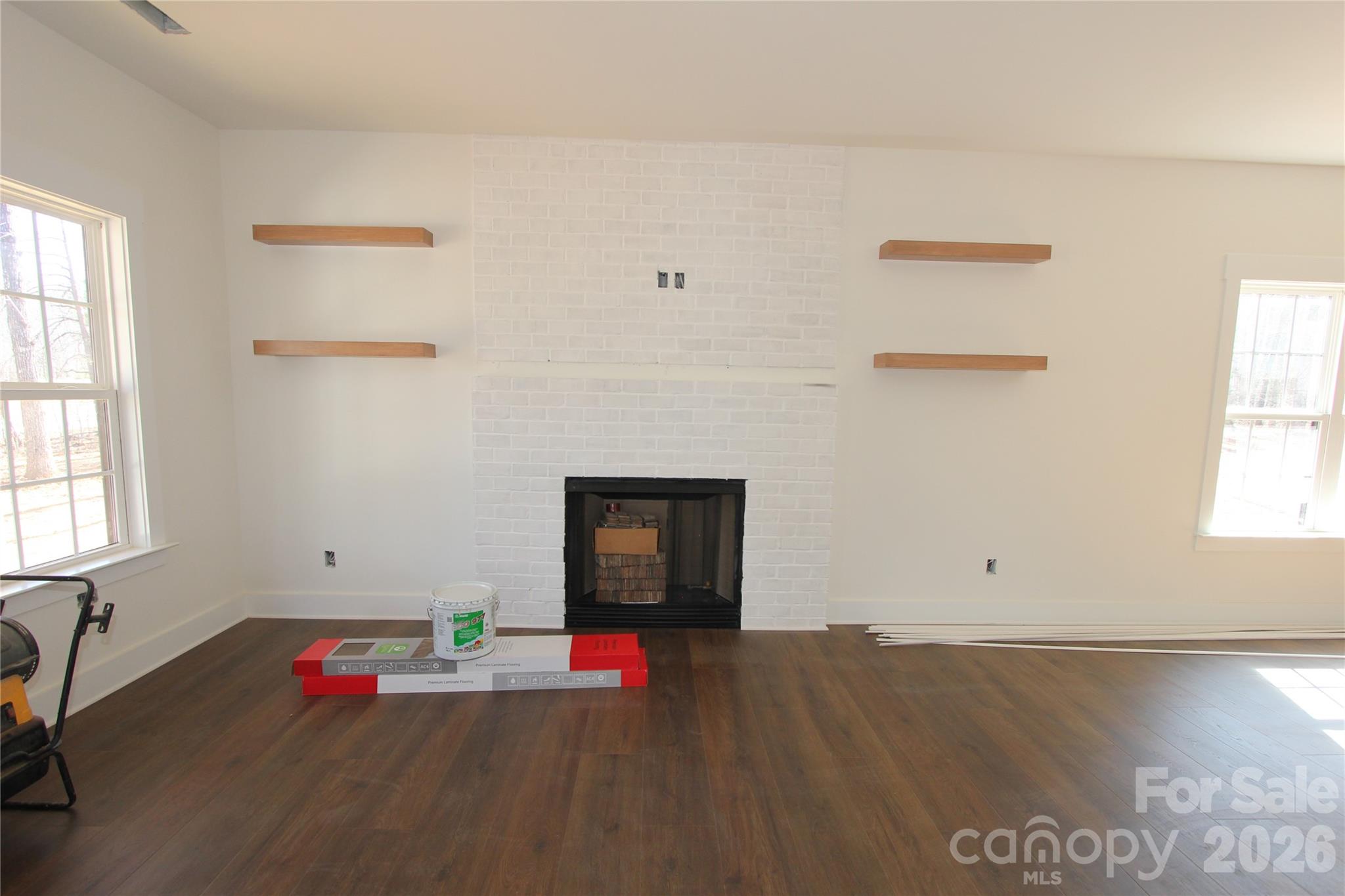 155 Rudisill Road Lincolnton, NC 28092 - Photo 4 of 15 a view of empty room with window and fireplace