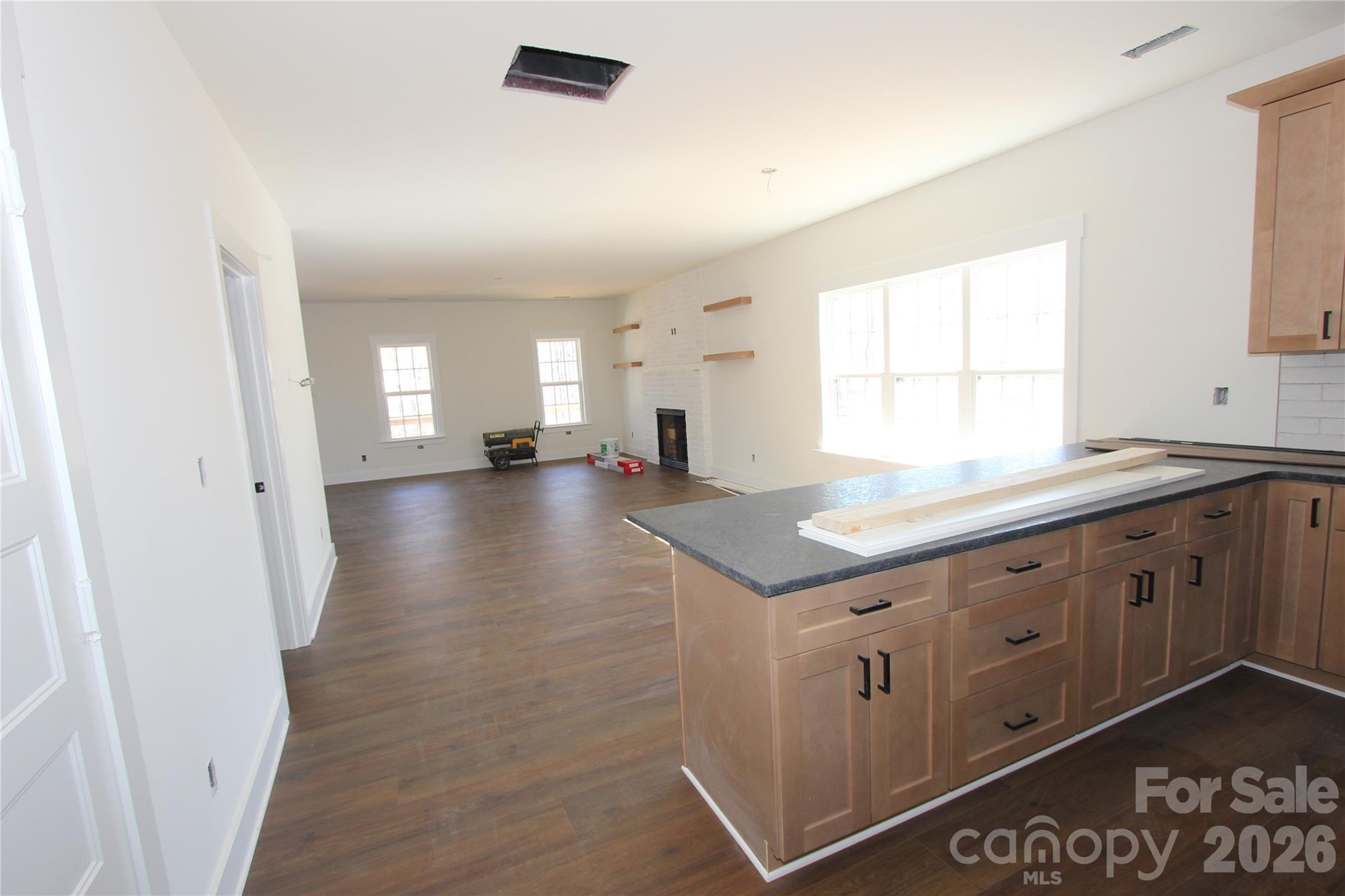 155 Rudisill Road Lincolnton, NC 28092 - Photo 6 of 15 a spacious bathroom with a granite countertop sink and a large mirror