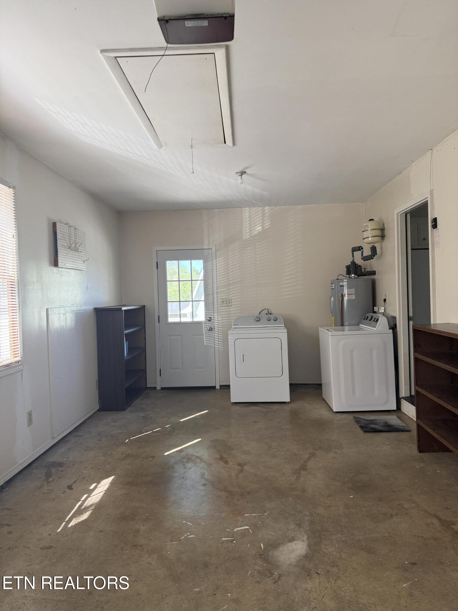 7716 Ashley Road, Unit 7 Powell, TN 37849 - Photo 17 of 17 washer/ dryer in garage