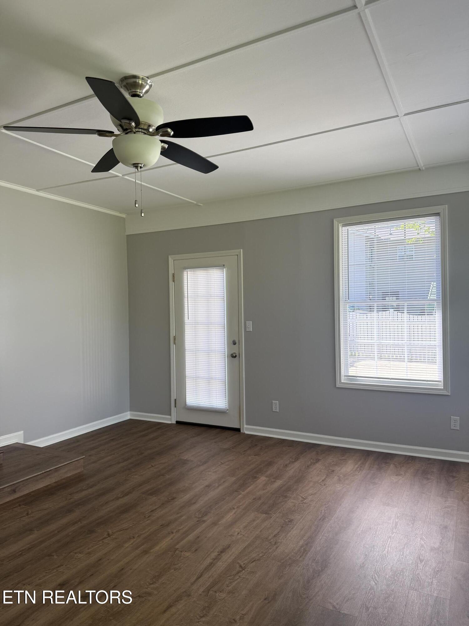 7716 Ashley Road, Unit 7 Powell, TN 37849 - Photo 10 of 17 sunroom door to patio