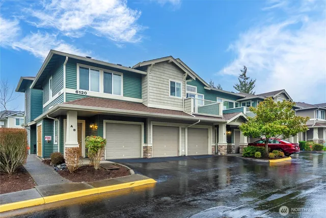 a front view of a house with swimming pool