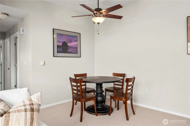 a view of a dining room with furniture