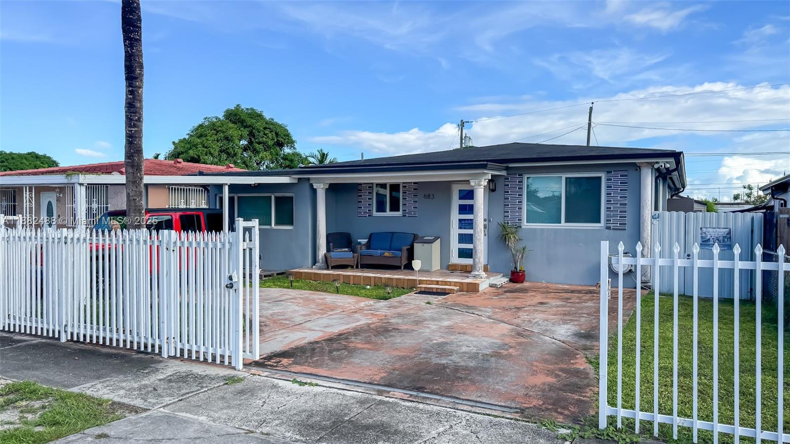 683 Southeast 6th Place Hialeah, FL 33010 - Photo 1 of 18 a front view of a house with a patio