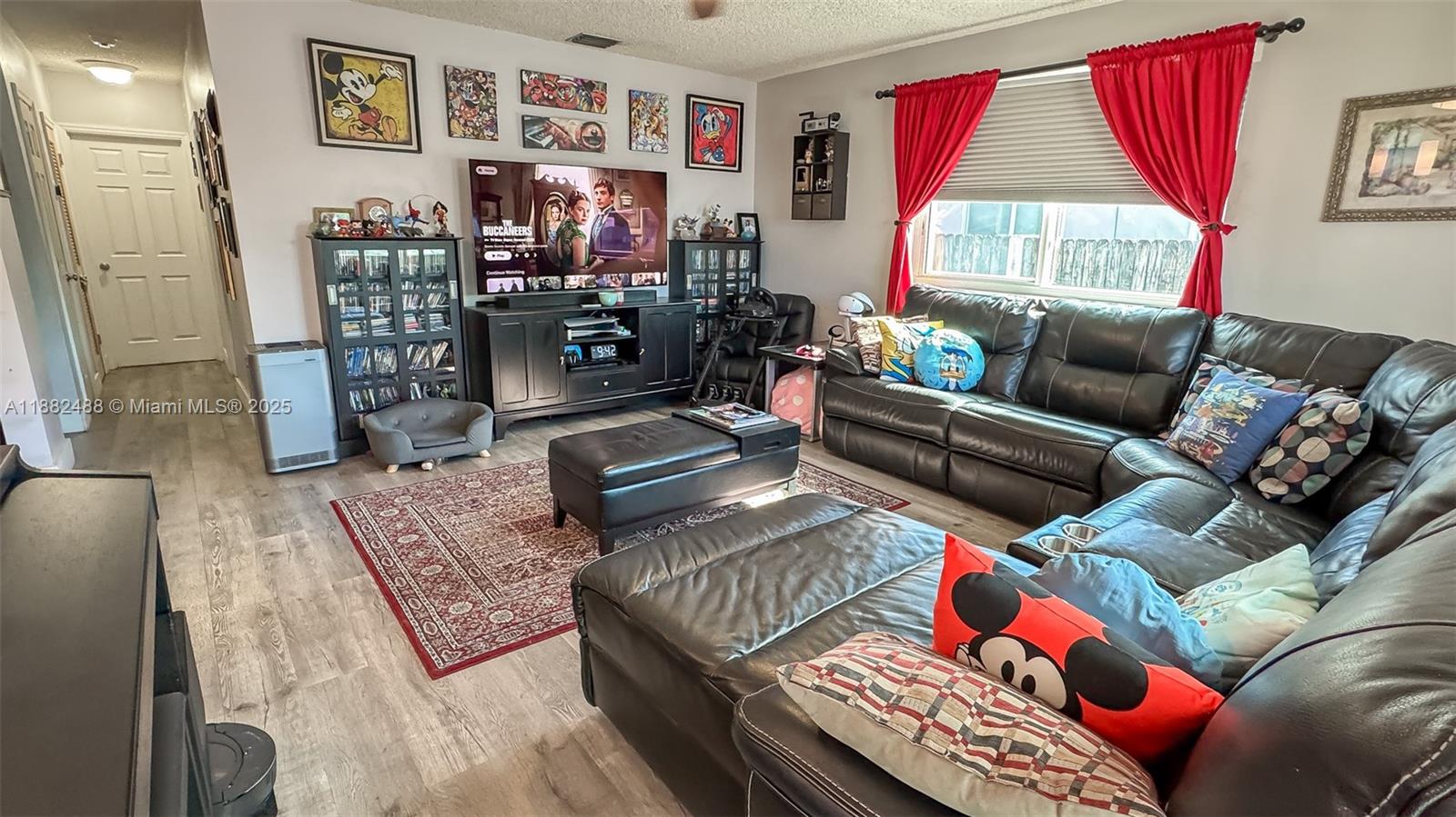 683 Southeast 6th Place Hialeah, FL 33010 - Photo 2 of 18 a living room with furniture and a window