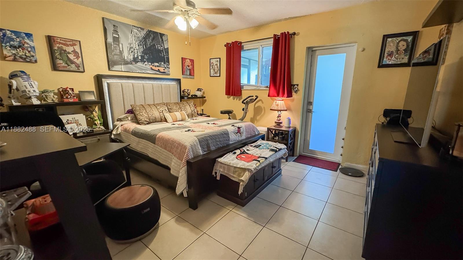 683 Southeast 6th Place Hialeah, FL 33010 - Photo 4 of 18 a bed room with a bed and furniture