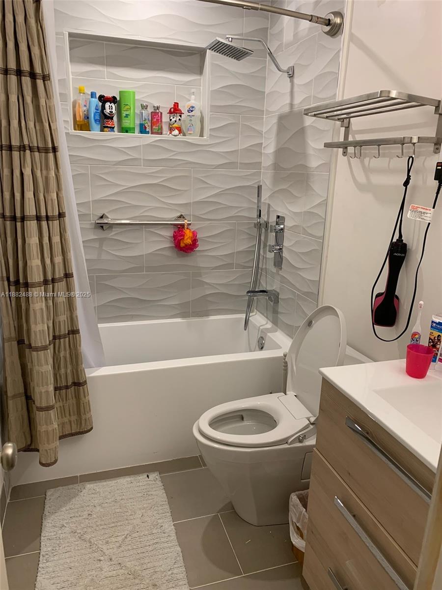 683 Southeast 6th Place Hialeah, FL 33010 - Photo 10 of 18 a bathroom with a toilet and a shower