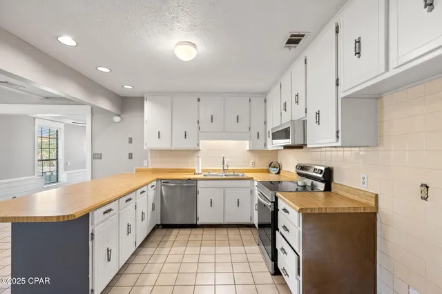 $400,000 | 144 Sandollar Drive, Panama City Beach, FL 32408