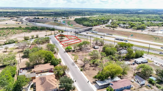 an aerial view of residential building and parking space