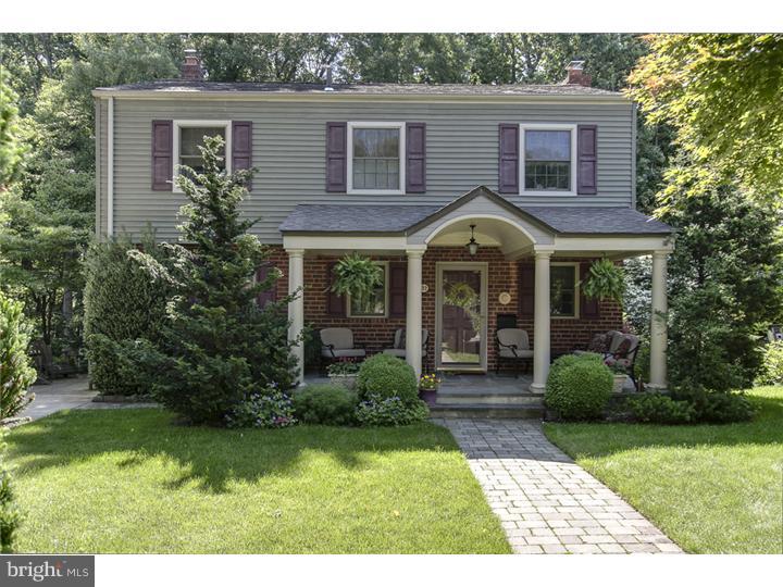 8422 Chippewa Road Philadelphia, PA 19128 - Photo 1 of 25 a front view of a house with garden