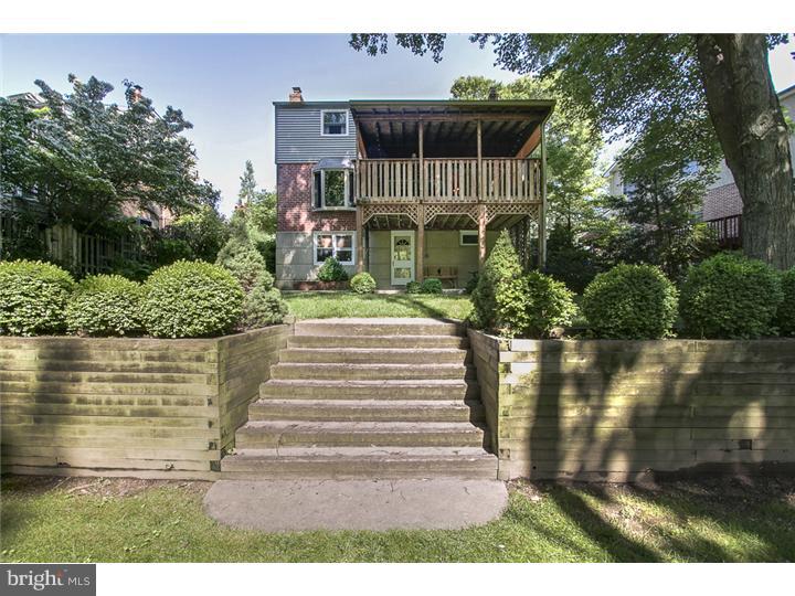 8422 Chippewa Road Philadelphia, PA 19128 - Photo 22 of 25 a front view of a house with a yard