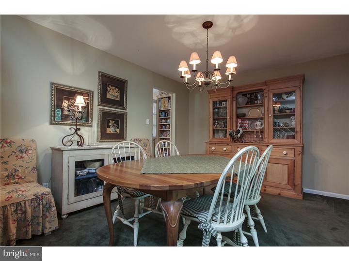 8422 Chippewa Road Philadelphia, PA 19128 - Photo 5 of 25 a view of a dining room with furniture and chandelier