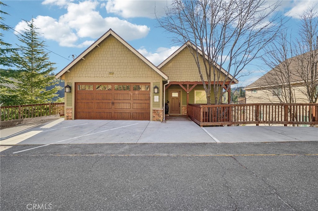 26845 Modoc Lane Lake Arrowhead, CA 92352 - Photo 2 of 56 Generous parking apron striped for multiple cars, plus easy, near-level access to the covered entry.