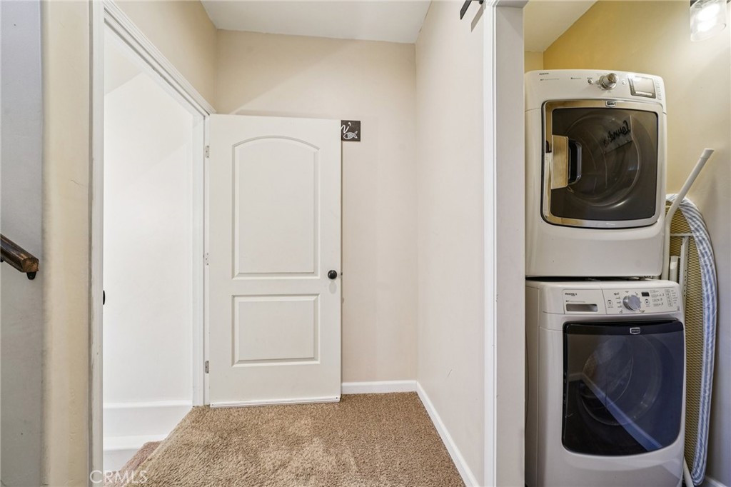26845 Modoc Lane Lake Arrowhead, CA 92352 - Photo 24 of 56 a view of a storage & utility room with washer and dryer