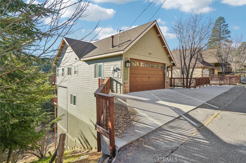 26845 Modoc Lane Lake Arrowhead, CA 92352 - Photo 3 of 56 a view of a house with a yard
