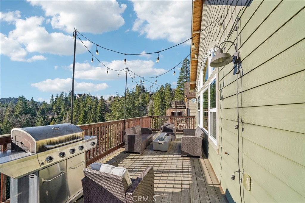 26845 Modoc Lane Lake Arrowhead, CA 92352 - Photo 49 of 56 a view of a balcony with furniture