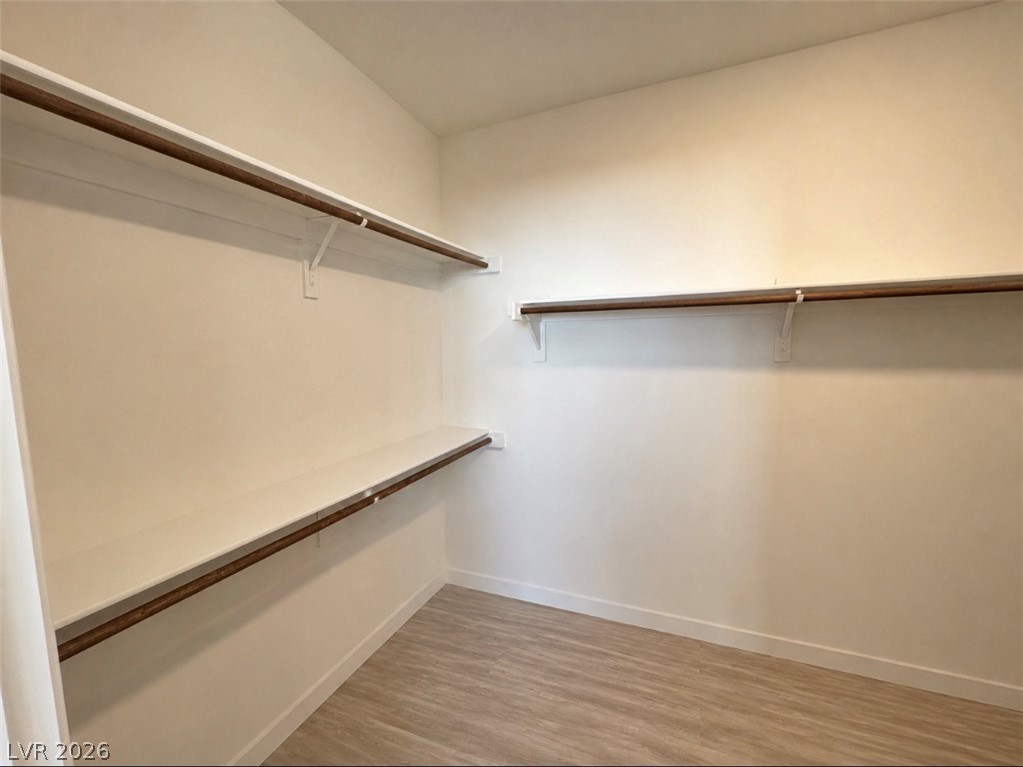2555 Hampton Road, Unit 4205 Henderson, NV 89052 - Photo 29 of 52 This spacious walk-in closet offers ample storage and organization solutions for any wardrobe.