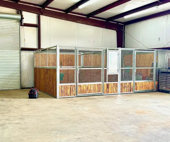 a view of a swimming pool with an outdoor seating