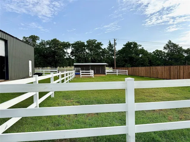 a view of a chairs and table on the terrace