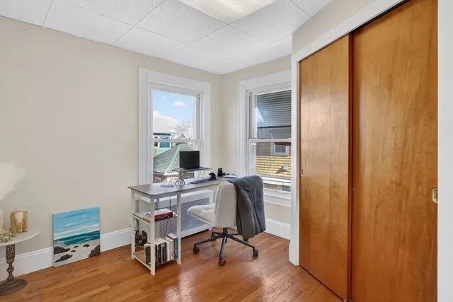 a bathroom with a sink a mirror and a toilet