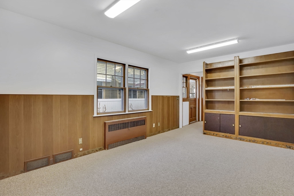264 Sumner Avenue Springfield, MA 01108 - Photo 26 of 32 a room with a dresser and a window