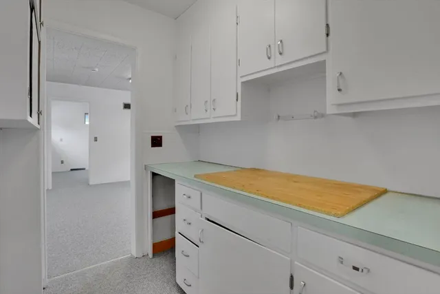 a living room with a wooden floor