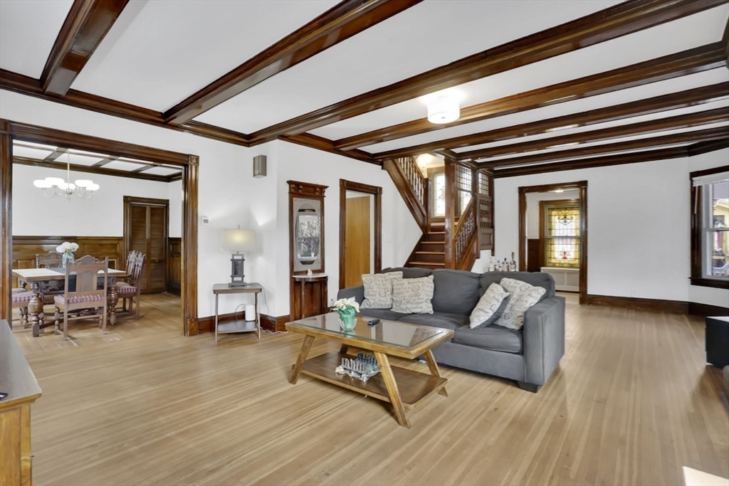 264 Sumner Avenue Springfield, MA 01108 - Photo 7 of 32 a living room with furniture and a wooden floor