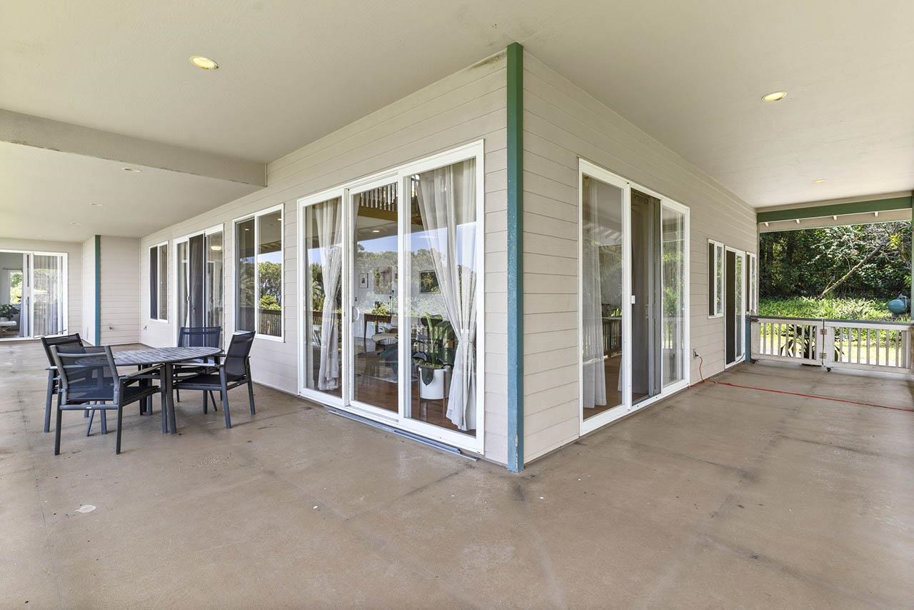 88 Kamalii Place Haiku, HI 96708 - Photo 13 of 24 a view of a livingroom with furniture and floor to ceiling window