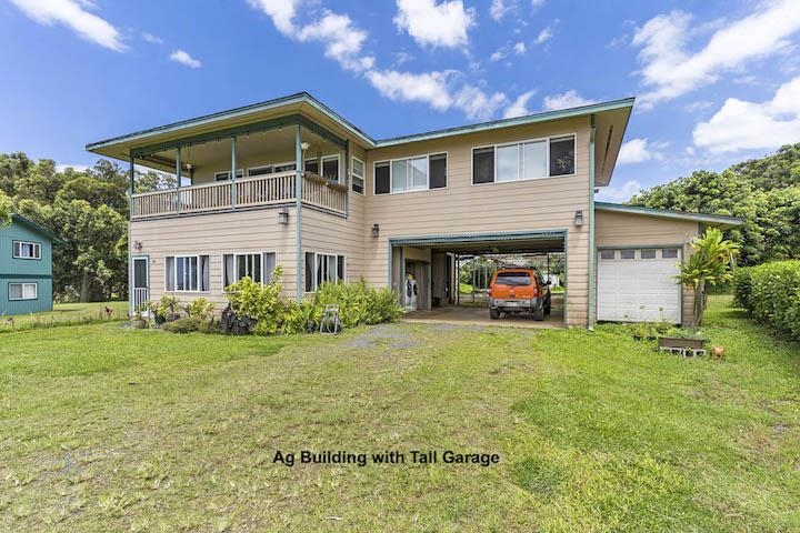 88 Kamalii Place Haiku, HI 96708 - Photo 14 of 24 a front view of a house with a yard