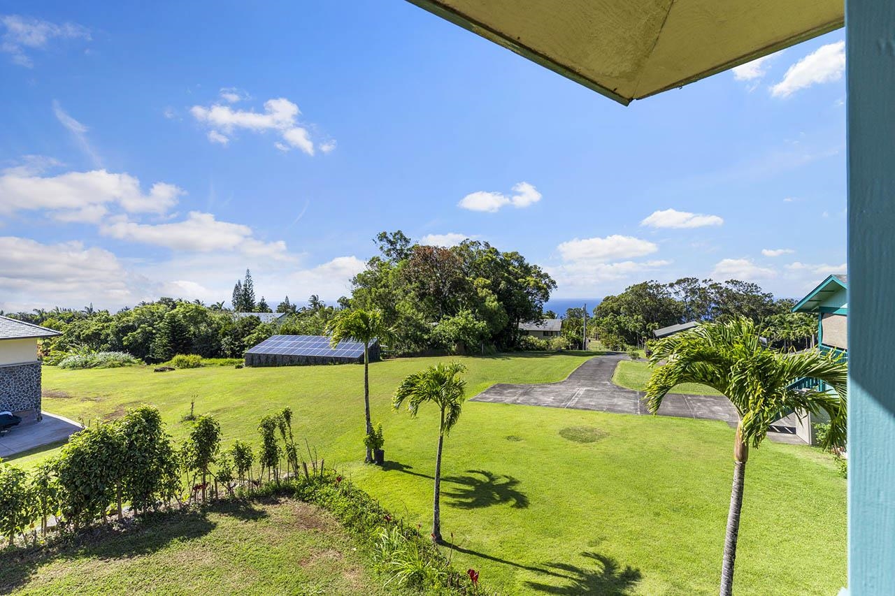 88 Kamalii Place Haiku, HI 96708 - Photo 16 of 24 a view of a lake with a yard