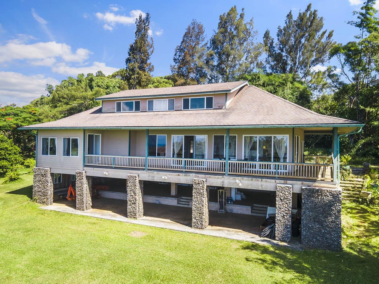 88 Kamalii Place Haiku, HI 96708 - Photo 2 of 24 a front view of a house with a yard balcony