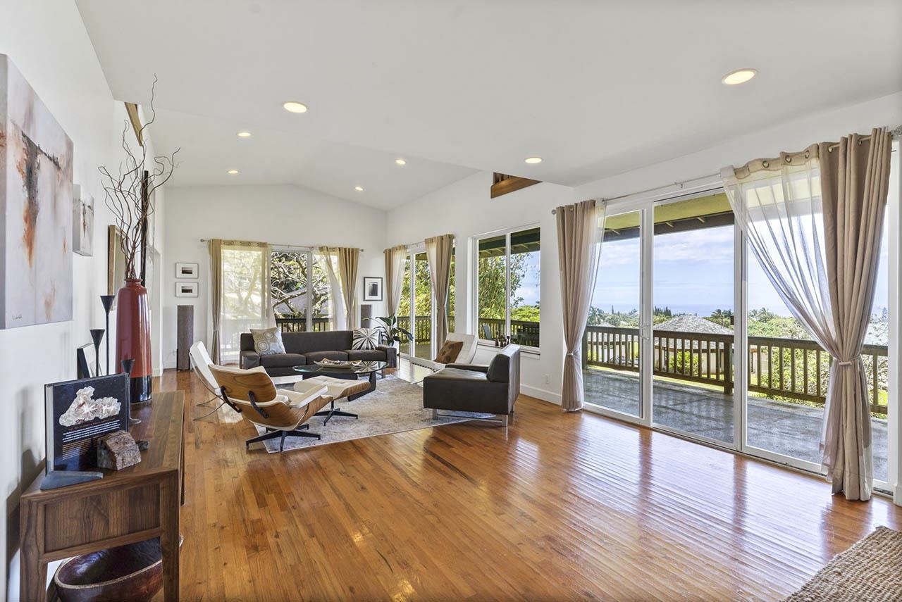 88 Kamalii Place Haiku, HI 96708 - Photo 4 of 24 a living room with furniture and a floor to ceiling window