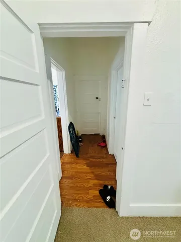 a bedroom with a bed and a cabinets