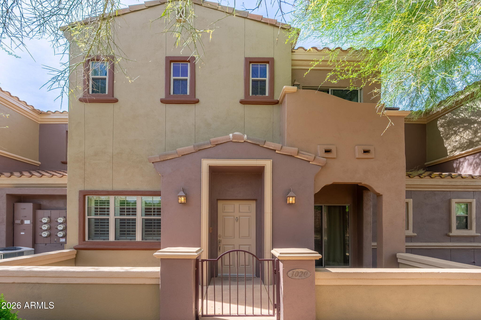 3935 East Rough Rider Road, Unit 1020 Phoenix, AZ 85050 - Photo 1 of 16 Entrace & Courtyard