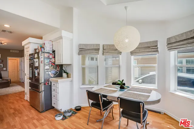 a workspace with furniture and window