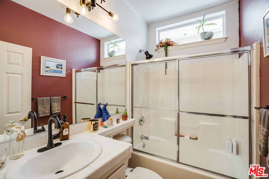 182 Comanche Topanga, CA 90290 - Photo 10 of 24 a bathroom with a sink toilet and shower