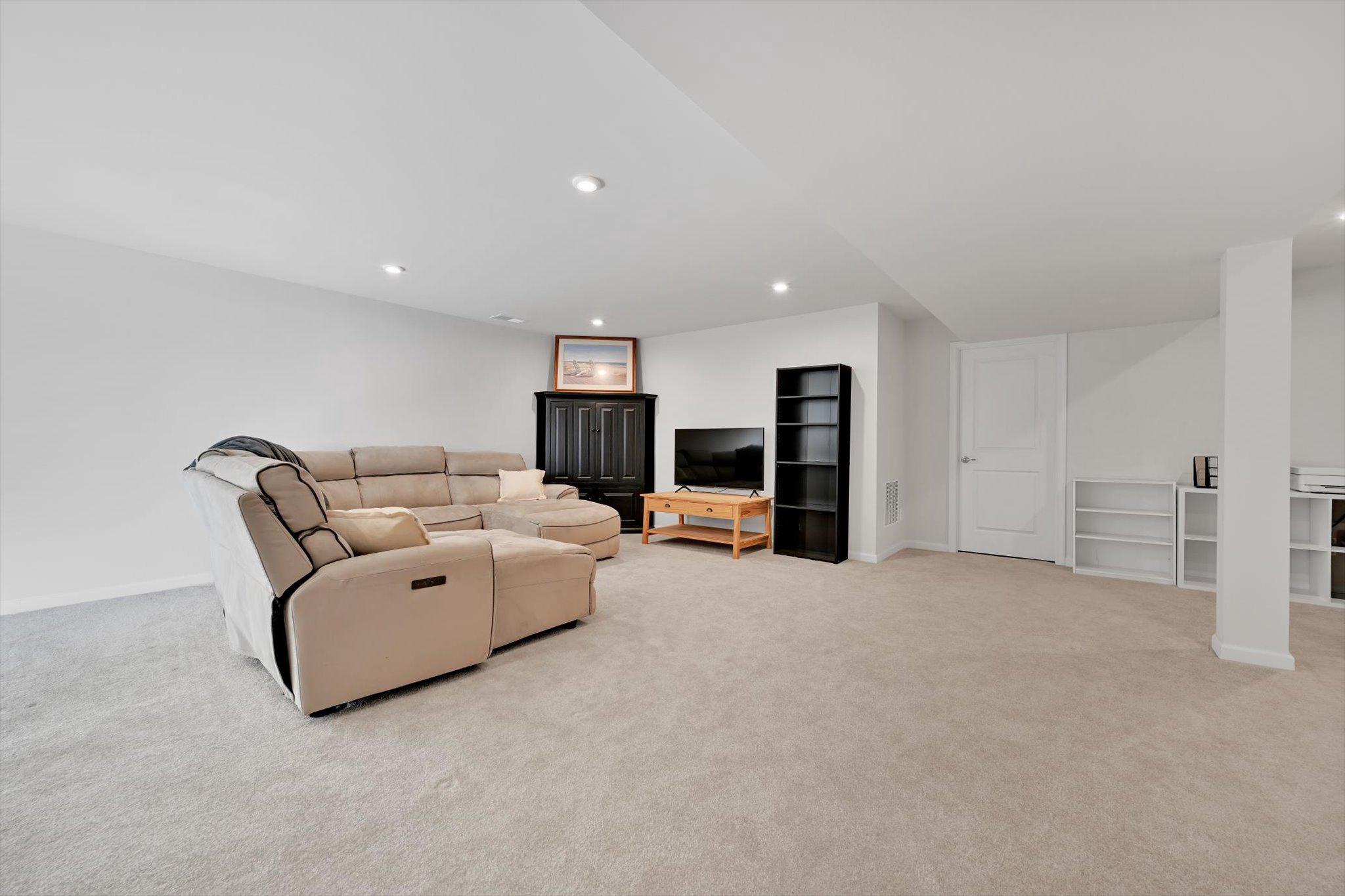 415 Courtland Road Atglen, PA 19310 - Photo 18 of 26 a living room with furniture and a flat screen tv