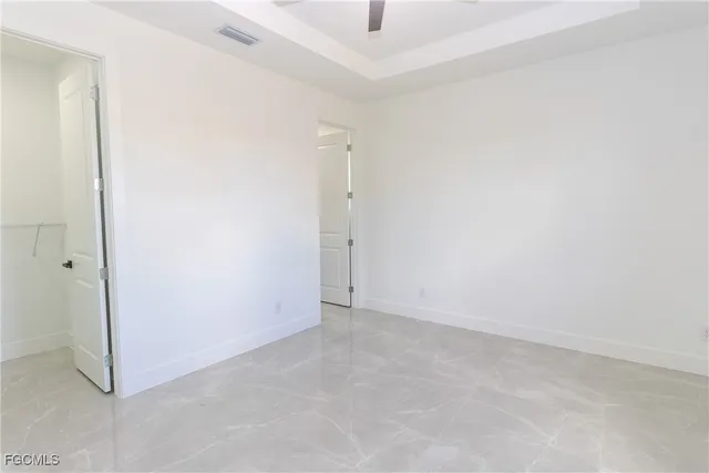 an empty room with an entryway
