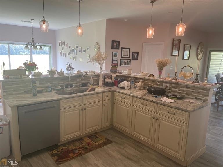 1911 Ellis Road Hogansville, GA 30230 - Photo 11 of 49 a kitchen with sink cabinets and outdoor view