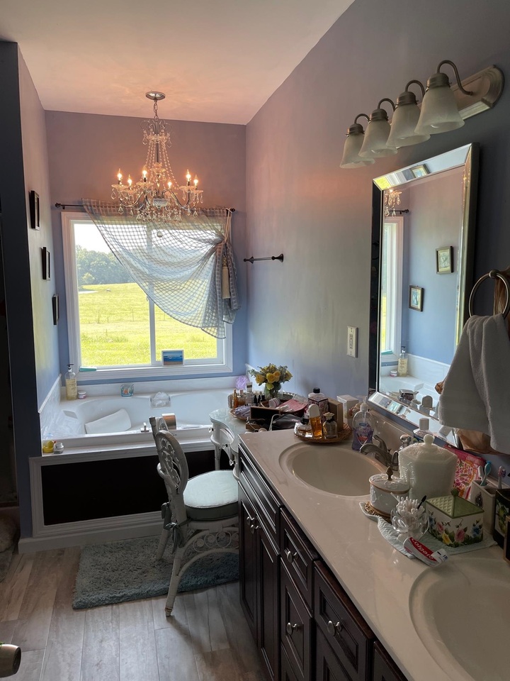 1911 Ellis Road Hogansville, GA 30230 - Photo 20 of 49 a bathroom with a sink double vanity and a mirror