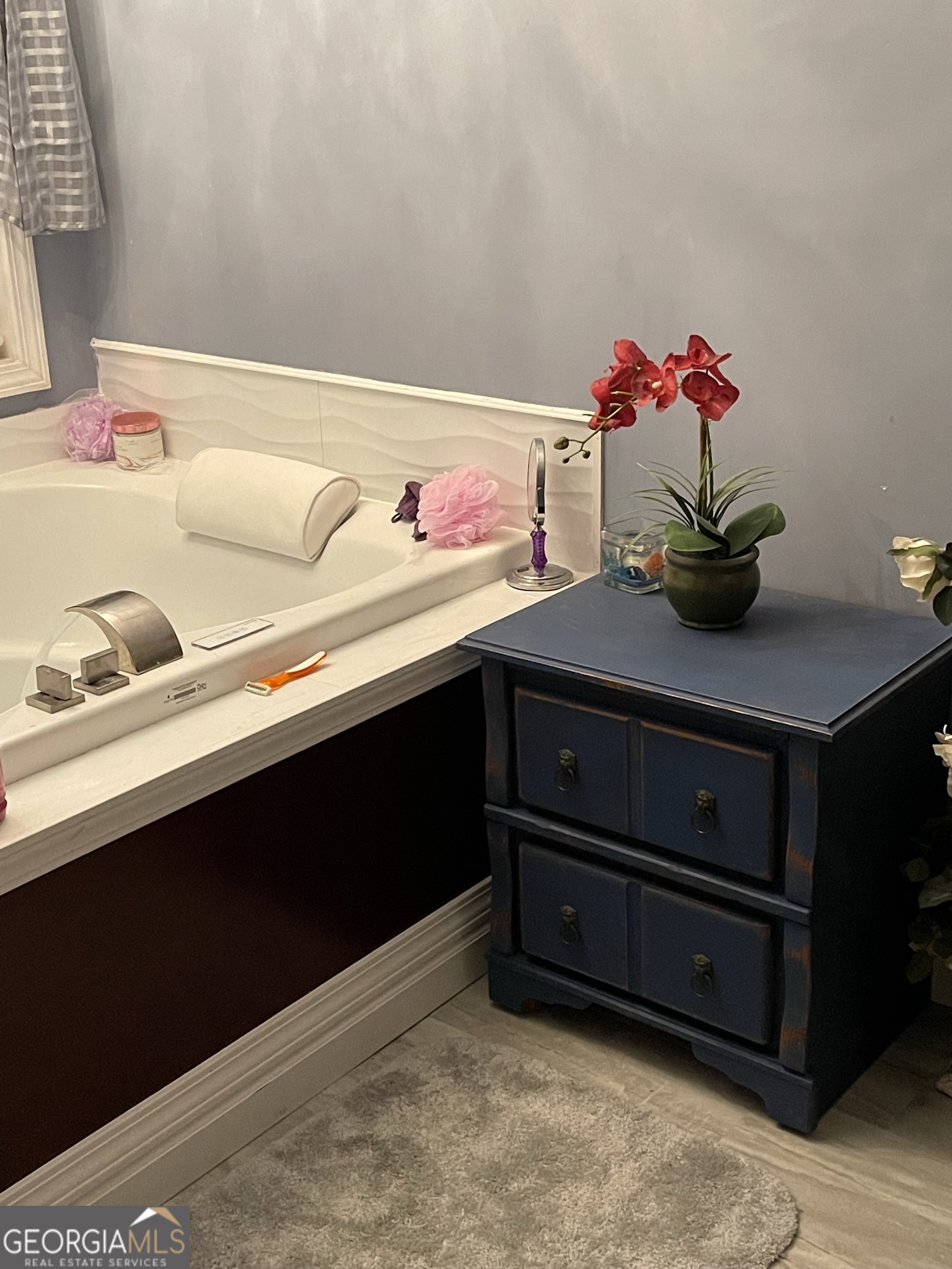 1911 Ellis Road Hogansville, GA 30230 - Photo 23 of 49 a bathroom with a sink and a mirror