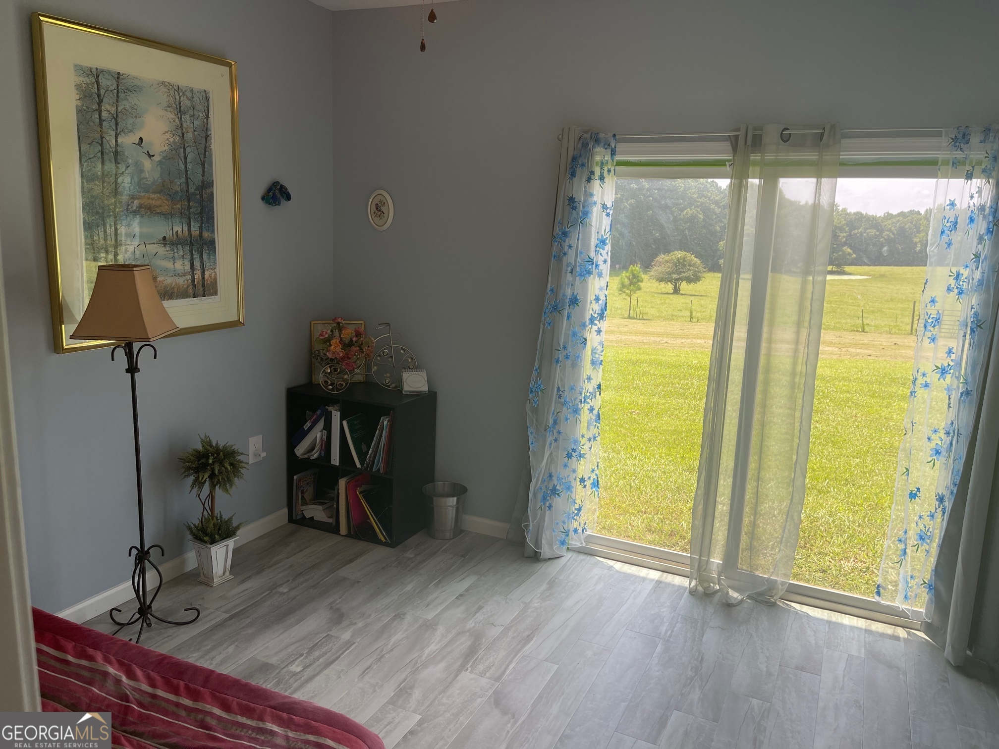 1911 Ellis Road Hogansville, GA 30230 - Photo 24 of 49 a view of room with window and wooden floor