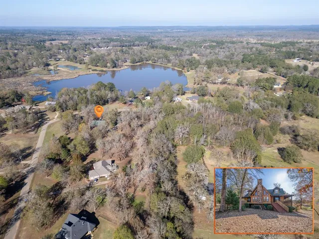 an aerial view of residential house and outdoor space