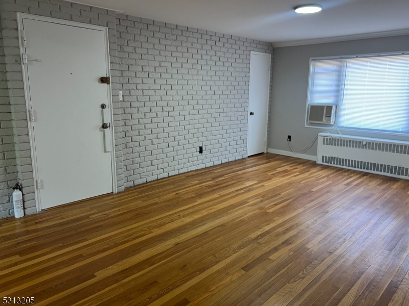 49 Garfield Park Edison, NJ 08837 - Photo 8 of 10 a view of empty room with wooden floor